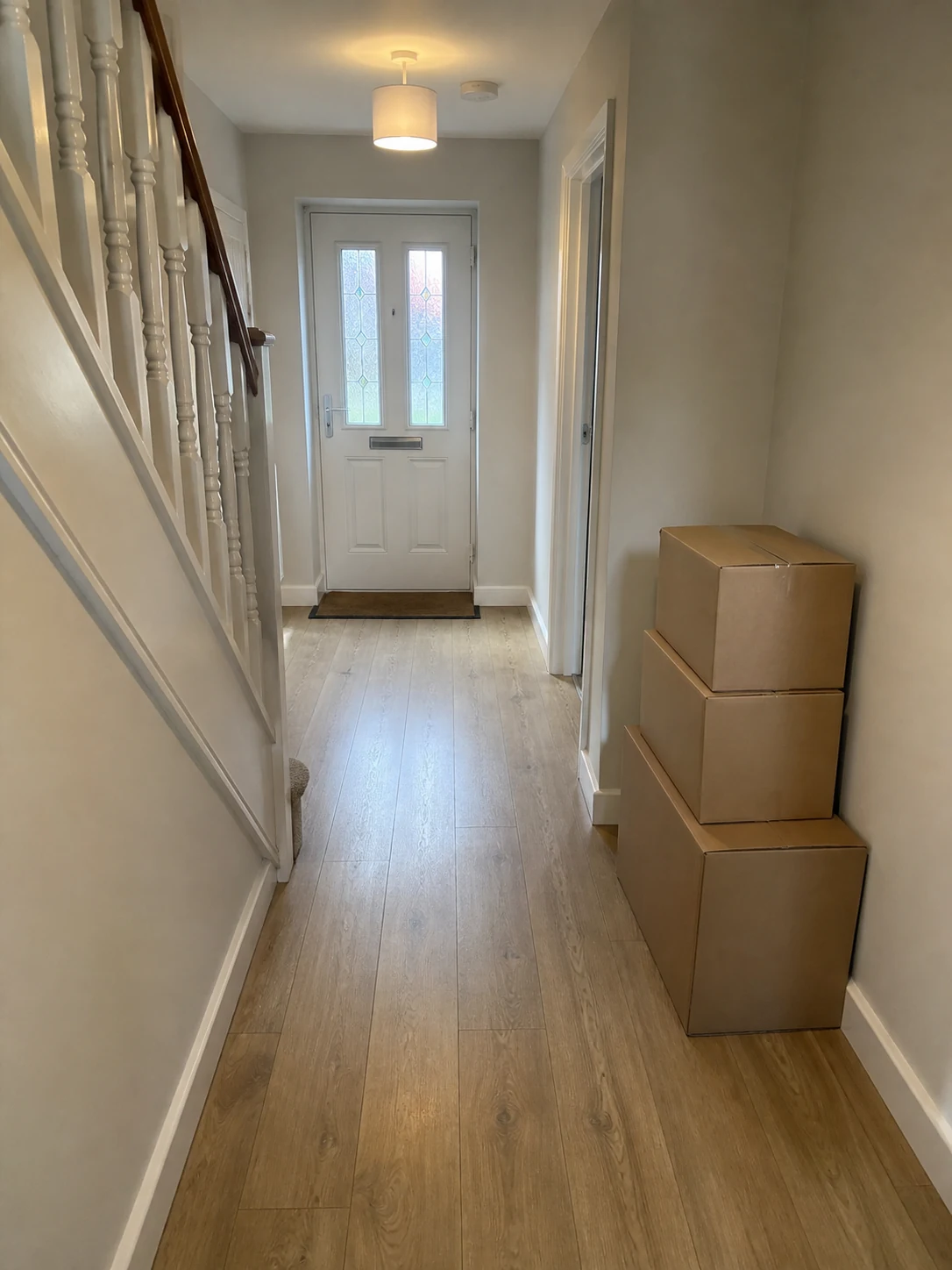 Clear hallway prepared with boxes before movers arrive